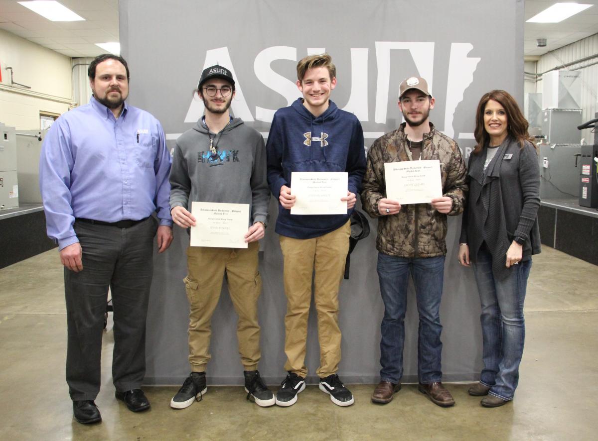 Pictured from left to right: Michael Nowlin, ASUN's Associate Dean for Applied Science, Ryan Powell (Second Place), Jordan White (First Place), Jacob Grimes (Third Place), and Dr. Holly Smith, Vice Chancellor for Academic Affairs