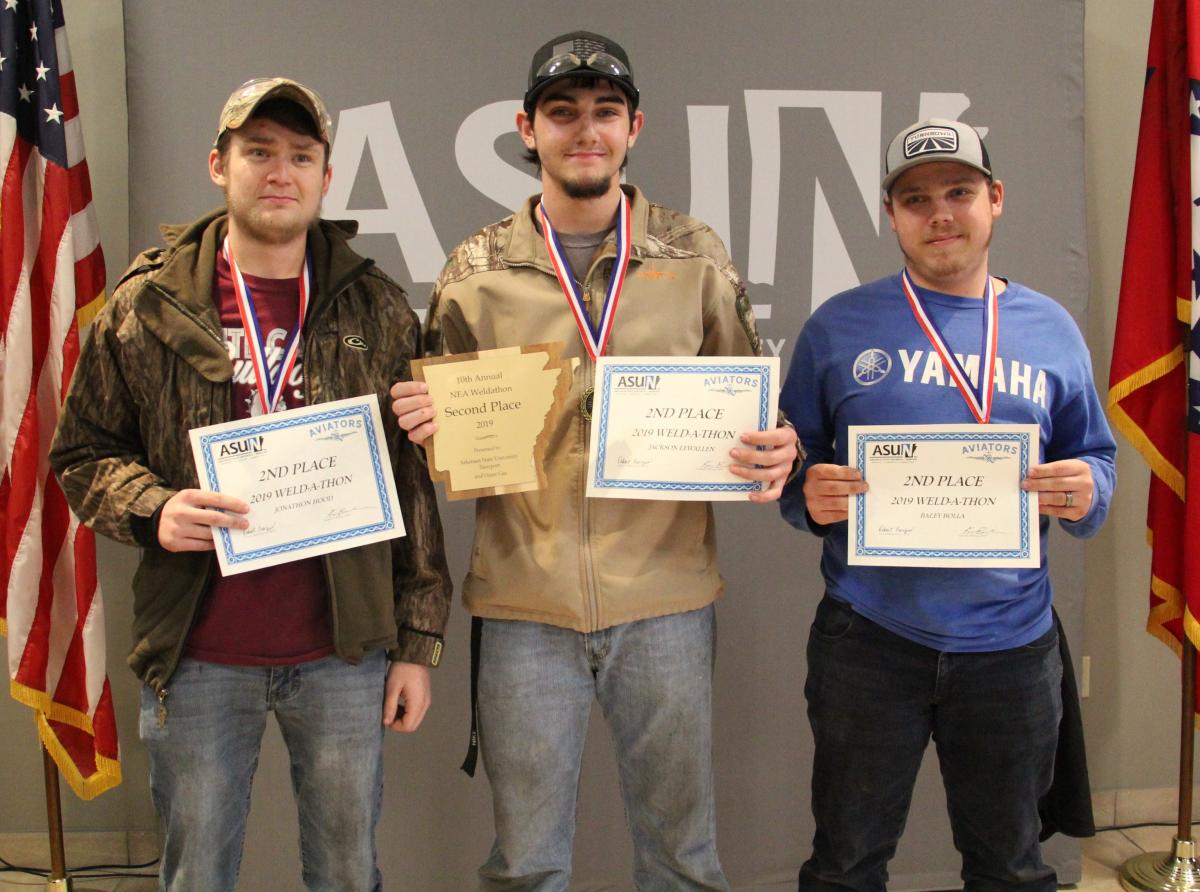 Second place winners pictured from left: Jonathan Hood, Jackson Lewallen and Baley Bolla