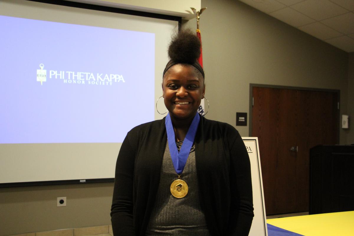 Maya James pictured at the most recent PTK Induction Ceremony.